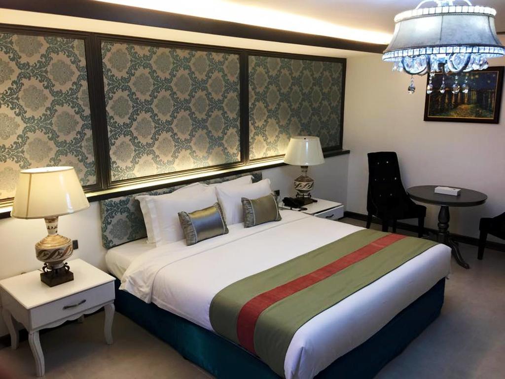 The Pepperland Hotel Легаспи Номер фото